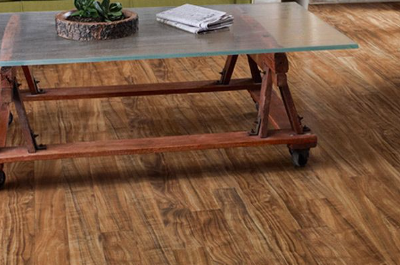 coffee table sitting on vinyl plank flooring